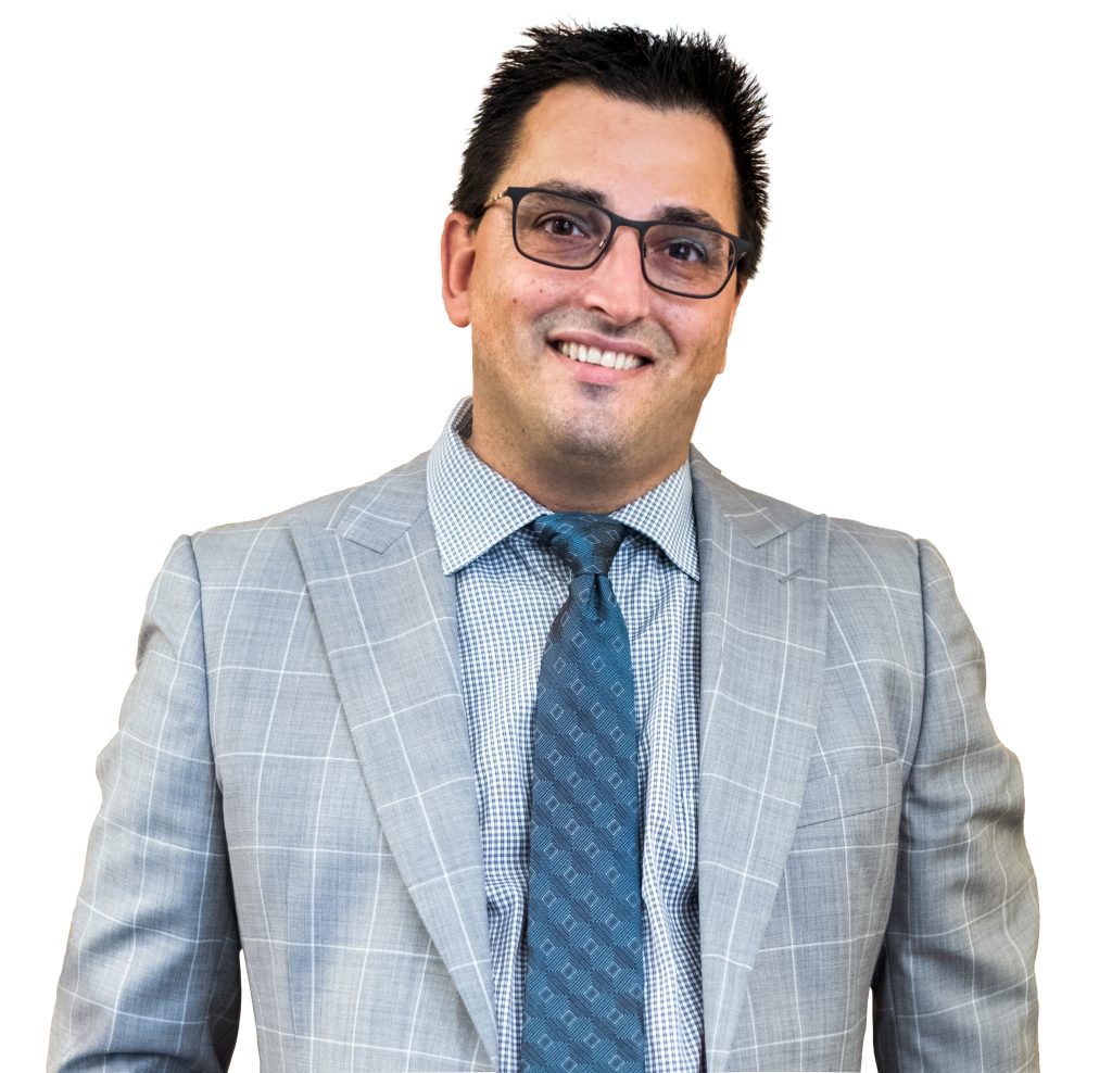 Candido Ferreira, dedicated Portuguese real estate agent in Ontario, with a bright smile.