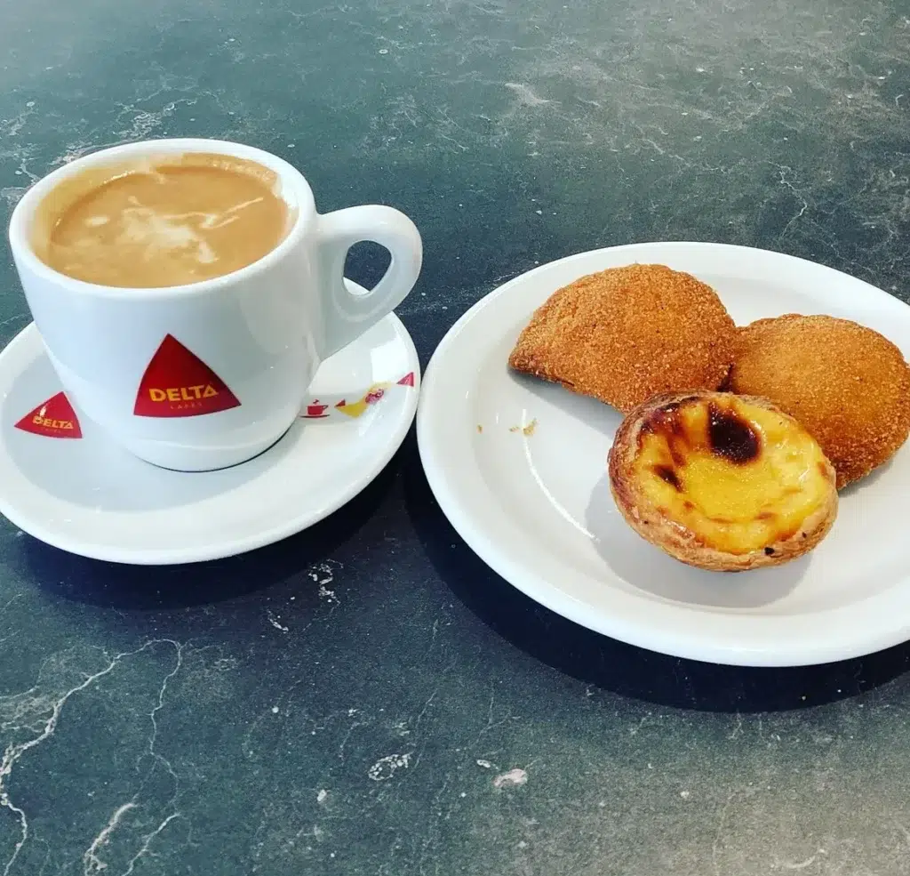 Portuguese custard tart (pastel de nata) and coffee at WildFlour Bakery.